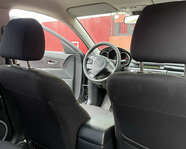 Черный Мазда 3, объемом двигателя 1.6 л и пробегом 189 тыс. км за 4500 $, фото 17 на Automoto.ua