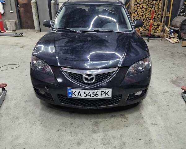 Черный Мазда 3, объемом двигателя 1.6 л и пробегом 240 тыс. км за 4200 $, фото 1 на Automoto.ua
