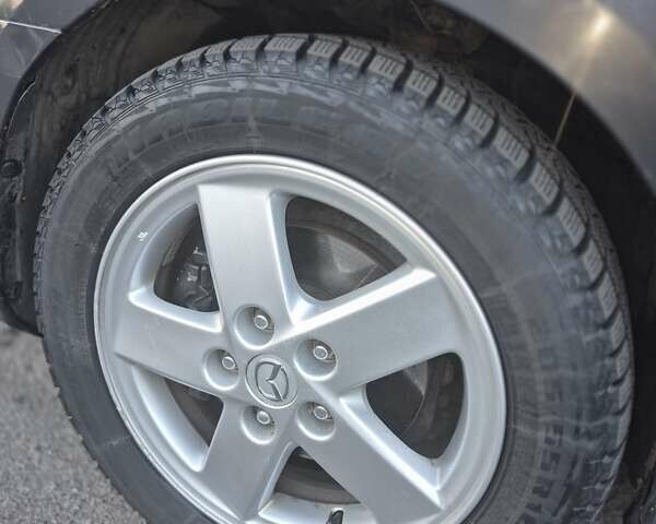 Чорний Мазда 3, об'ємом двигуна 1.6 л та пробігом 168 тис. км за 5600 $, фото 10 на Automoto.ua