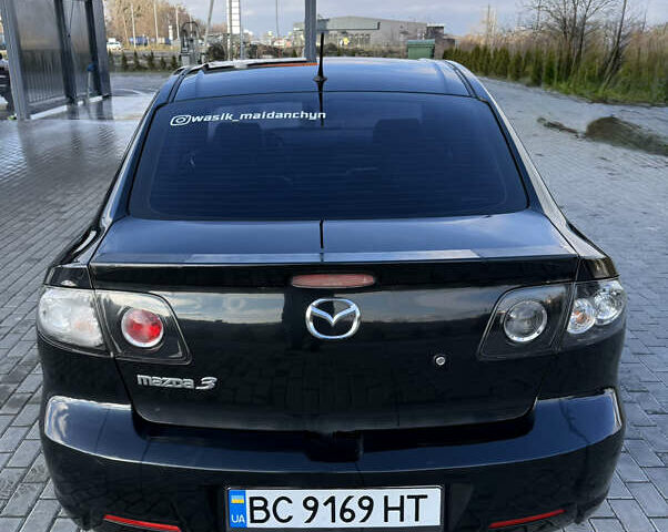 Черный Мазда 3, объемом двигателя 2 л и пробегом 154 тыс. км за 5500 $, фото 4 на Automoto.ua