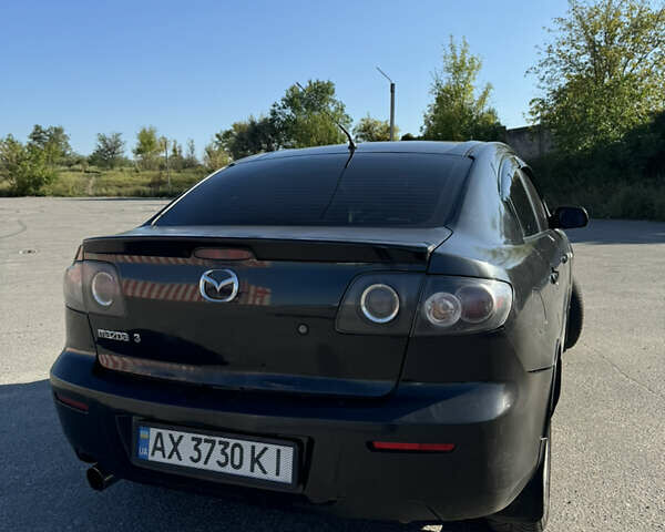 Черный Мазда 3, объемом двигателя 2 л и пробегом 150 тыс. км за 5999 $, фото 12 на Automoto.ua