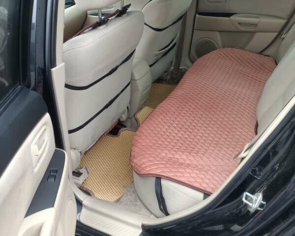 Черный Мазда 3, объемом двигателя 1.6 л и пробегом 232 тыс. км за 5850 $, фото 10 на Automoto.ua