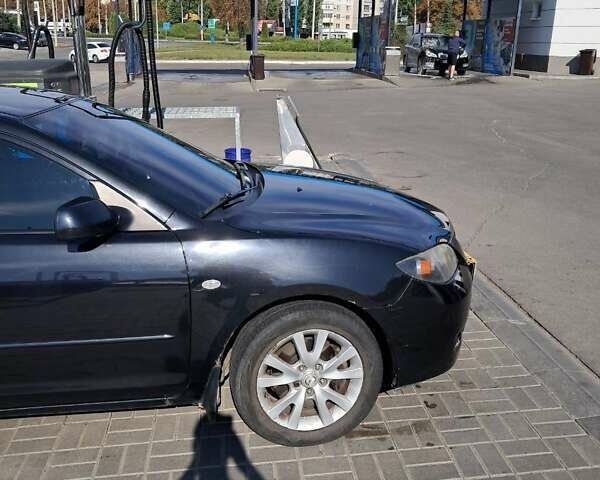 Мазда 3 2007 в Кременчуге на Automoto.ua Черный Мазда 3, объемом двигателя 2 л и пробегом 224 тыс. км за 5500 $, фото 13 на Automoto.ua