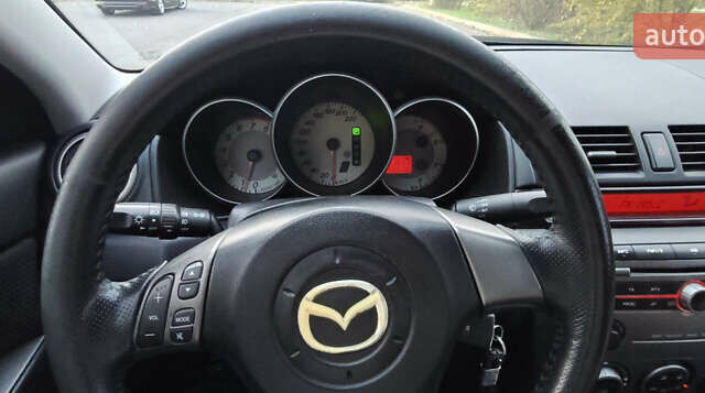 Чорний Мазда 3, об'ємом двигуна 2 л та пробігом 143 тис. км за 5200 $, фото 4 на Automoto.ua