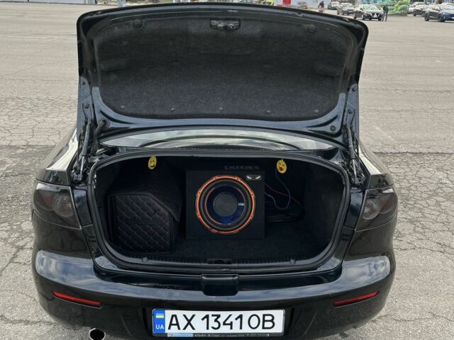 Черный Мазда 3, объемом двигателя 2 л и пробегом 166 тыс. км за 6000 $, фото 8 на Automoto.ua