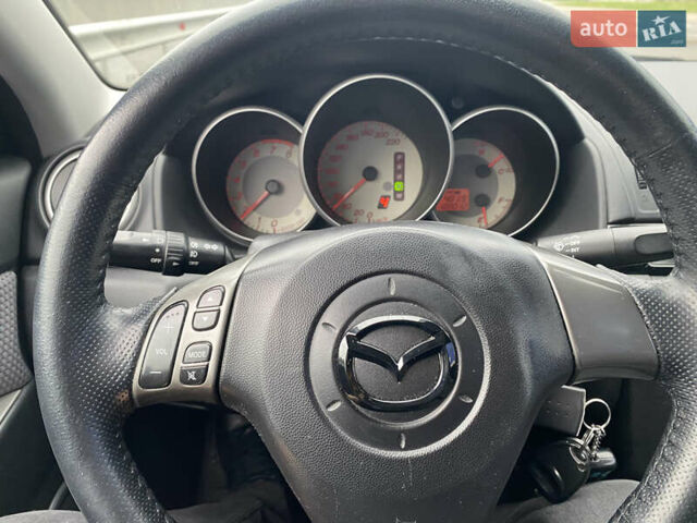 Чорний Мазда 3, об'ємом двигуна 1.6 л та пробігом 188 тис. км за 6800 $, фото 28 на Automoto.ua