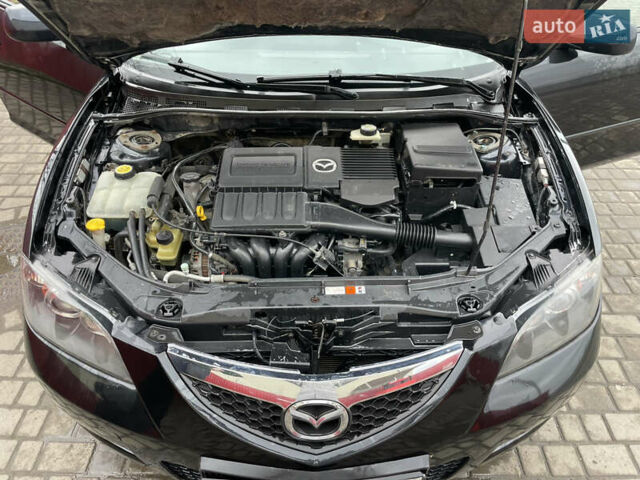 Черный Мазда 3, объемом двигателя 1.6 л и пробегом 189 тыс. км за 4500 $, фото 19 на Automoto.ua