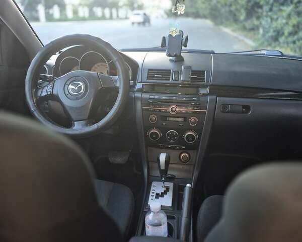 Чорний Мазда 3, об'ємом двигуна 1.6 л та пробігом 168 тис. км за 5600 $, фото 8 на Automoto.ua