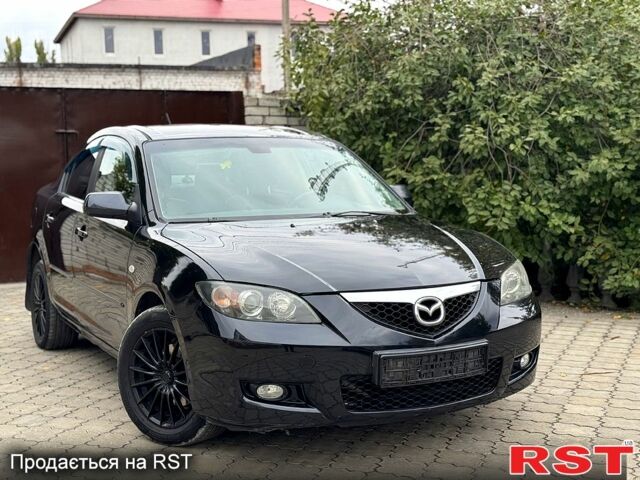 Черный Мазда 3, объемом двигателя 1.6 л и пробегом 201 тыс. км за 5900 $, фото 1 на Automoto.ua
