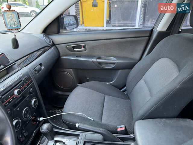 Черный Мазда 3, объемом двигателя 1.6 л и пробегом 350 тыс. км за 4700 $, фото 5 на Automoto.ua