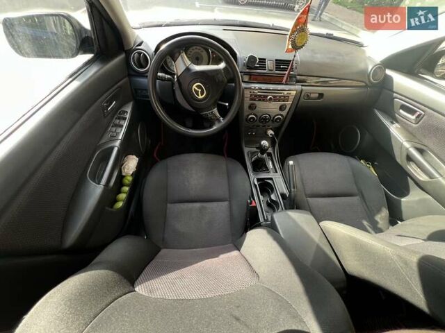 Черный Мазда 3, объемом двигателя 1.6 л и пробегом 310 тыс. км за 4800 $, фото 10 на Automoto.ua