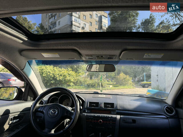 Черный Мазда 3, объемом двигателя 2 л и пробегом 150 тыс. км за 5999 $, фото 31 на Automoto.ua