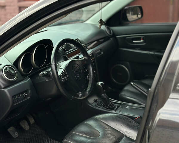 Чорний Мазда 3, об'ємом двигуна 2 л та пробігом 230 тис. км за 6800 $, фото 16 на Automoto.ua