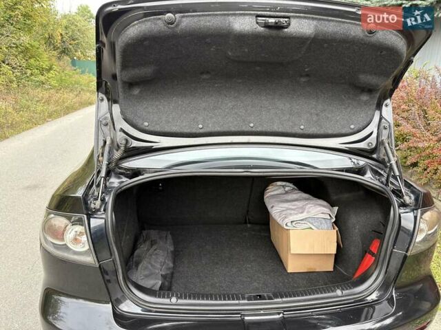 Черный Мазда 3, объемом двигателя 1.6 л и пробегом 263 тыс. км за 5900 $, фото 28 на Automoto.ua