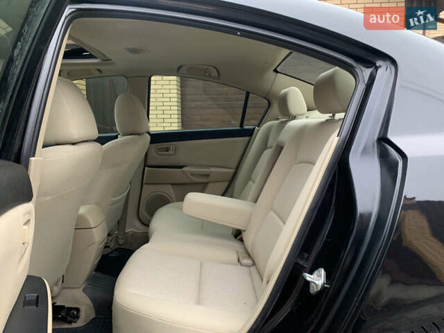 Черный Мазда 3, объемом двигателя 1.6 л и пробегом 200 тыс. км за 4999 $, фото 20 на Automoto.ua