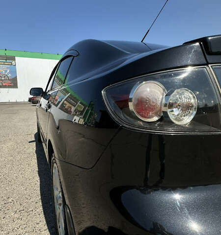 Чорний Мазда 3, об'ємом двигуна 2 л та пробігом 230 тис. км за 6800 $, фото 3 на Automoto.ua