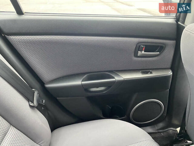 Чорний Мазда 3, об'ємом двигуна 1.6 л та пробігом 188 тис. км за 6800 $, фото 27 на Automoto.ua