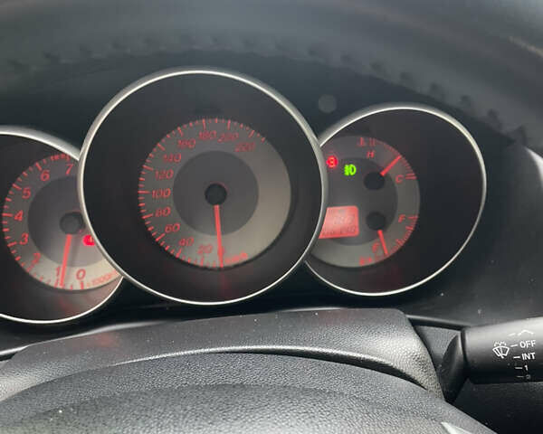 Черный Мазда 3, объемом двигателя 1.6 л и пробегом 206 тыс. км за 6000 $, фото 12 на Automoto.ua