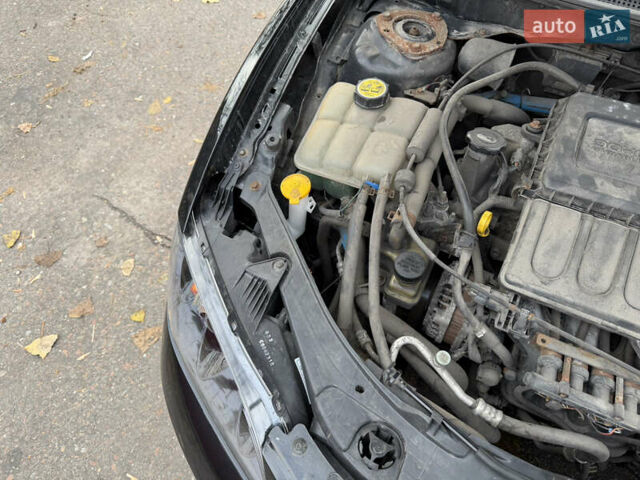 Черный Мазда 3, объемом двигателя 1.6 л и пробегом 189 тыс. км за 4300 $, фото 16 на Automoto.ua