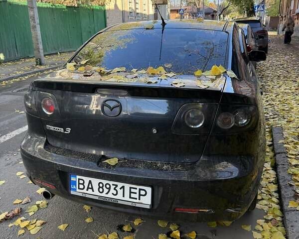Черный Мазда 3, объемом двигателя 2 л и пробегом 218 тыс. км за 4000 $, фото 1 на Automoto.ua