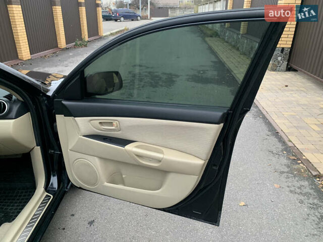 Черный Мазда 3, объемом двигателя 1.6 л и пробегом 200 тыс. км за 4999 $, фото 25 на Automoto.ua