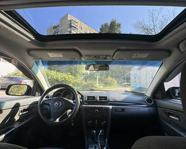 Черный Мазда 3, объемом двигателя 2 л и пробегом 150 тыс. км за 5999 $, фото 33 на Automoto.ua