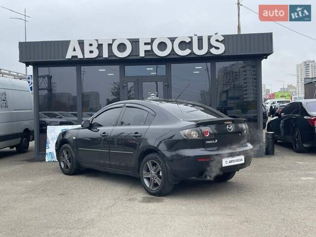 Чорний Мазда 3, об'ємом двигуна 1.6 л та пробігом 223 тис. км за 6490 $, фото 4 на Automoto.ua