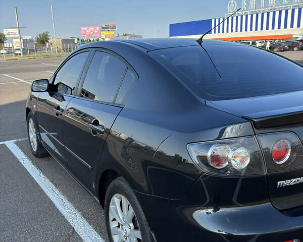 Чорний Мазда 3, об'ємом двигуна 1.6 л та пробігом 230 тис. км за 6600 $, фото 5 на Automoto.ua