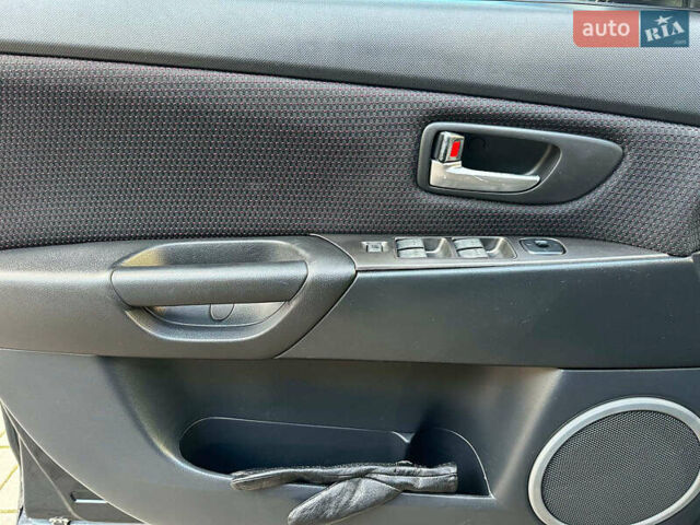 Черный Мазда 3, объемом двигателя 1.6 л и пробегом 232 тыс. км за 6740 $, фото 22 на Automoto.ua