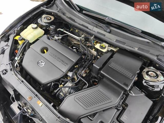 Чорний Мазда 3, об'ємом двигуна 2 л та пробігом 136 тис. км за 6300 $, фото 25 на Automoto.ua