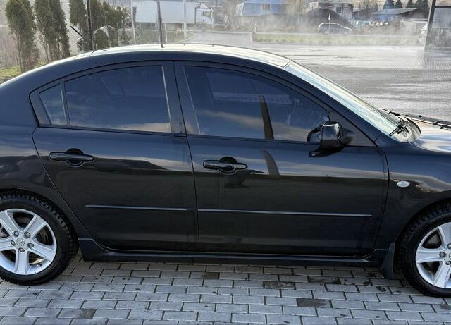 Черный Мазда 3, объемом двигателя 2 л и пробегом 154 тыс. км за 5500 $, фото 2 на Automoto.ua