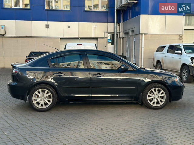 Черный Мазда 3, объемом двигателя 1.6 л и пробегом 232 тыс. км за 6740 $, фото 4 на Automoto.ua