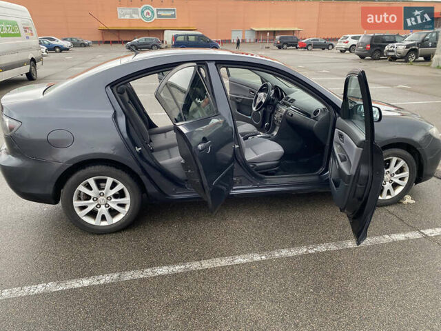 Чорний Мазда 3, об'ємом двигуна 1.6 л та пробігом 188 тис. км за 6800 $, фото 14 на Automoto.ua