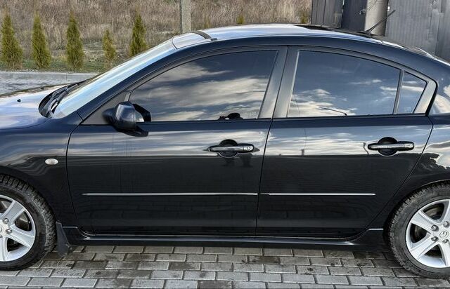 Черный Мазда 3, объемом двигателя 2 л и пробегом 154 тыс. км за 5500 $, фото 4 на Automoto.ua