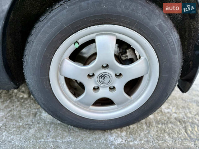 Черный Мазда 3, объемом двигателя 1.6 л и пробегом 210 тыс. км за 3950 $, фото 17 на Automoto.ua