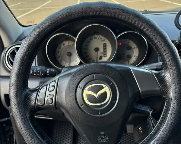 Чорний Мазда 3, об'ємом двигуна 1.6 л та пробігом 230 тис. км за 6600 $, фото 7 на Automoto.ua