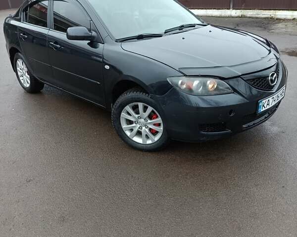 Черный Мазда 3, объемом двигателя 1.6 л и пробегом 232 тыс. км за 5850 $, фото 2 на Automoto.ua