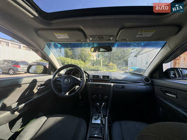 Черный Мазда 3, объемом двигателя 2 л и пробегом 150 тыс. км за 5999 $, фото 32 на Automoto.ua