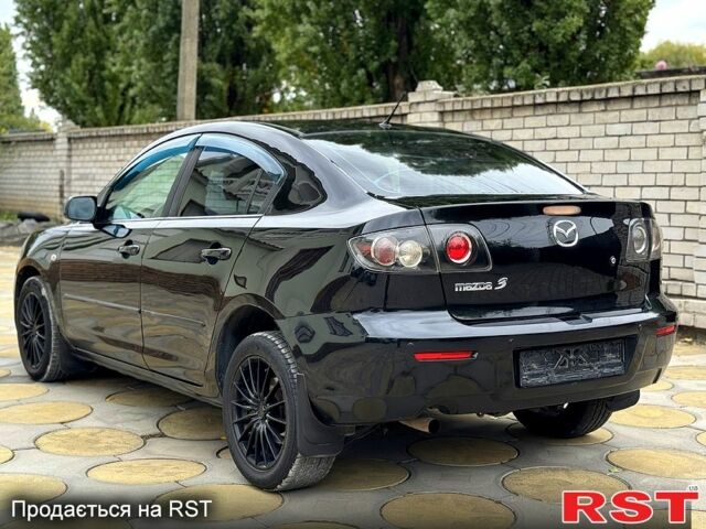 Черный Мазда 3, объемом двигателя 1.6 л и пробегом 201 тыс. км за 5900 $, фото 4 на Automoto.ua