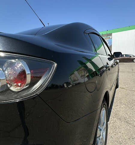 Чорний Мазда 3, об'ємом двигуна 2 л та пробігом 230 тис. км за 6800 $, фото 2 на Automoto.ua