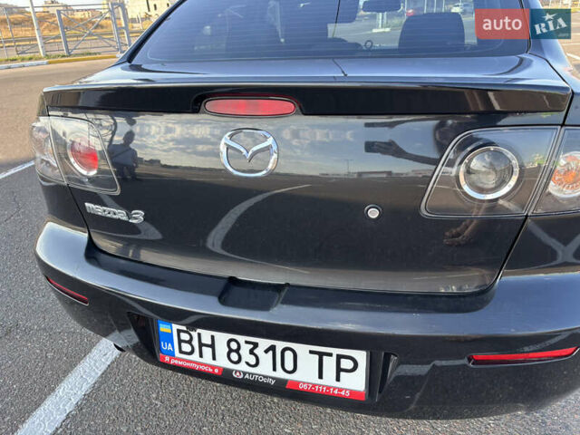 Чорний Мазда 3, об'ємом двигуна 1.6 л та пробігом 230 тис. км за 6600 $, фото 14 на Automoto.ua