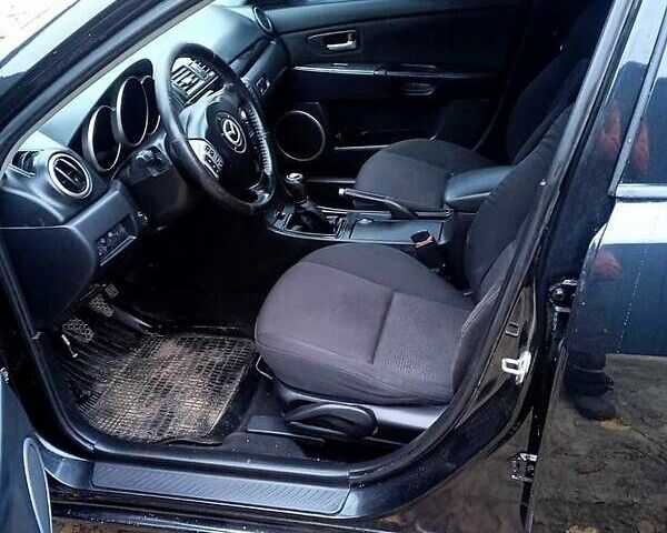 Черный Мазда 3, объемом двигателя 2 л и пробегом 240 тыс. км за 5600 $, фото 16 на Automoto.ua