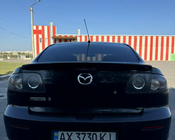 Черный Мазда 3, объемом двигателя 2 л и пробегом 150 тыс. км за 5999 $, фото 20 на Automoto.ua