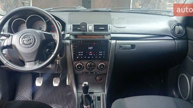 Чорний Мазда 3, об'ємом двигуна 2.02 л та пробігом 240 тис. км за 4800 $, фото 12 на Automoto.ua