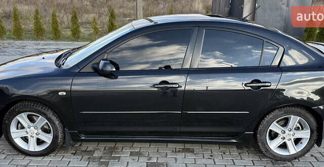 Черный Мазда 3, объемом двигателя 2 л и пробегом 154 тыс. км за 5500 $, фото 5 на Automoto.ua