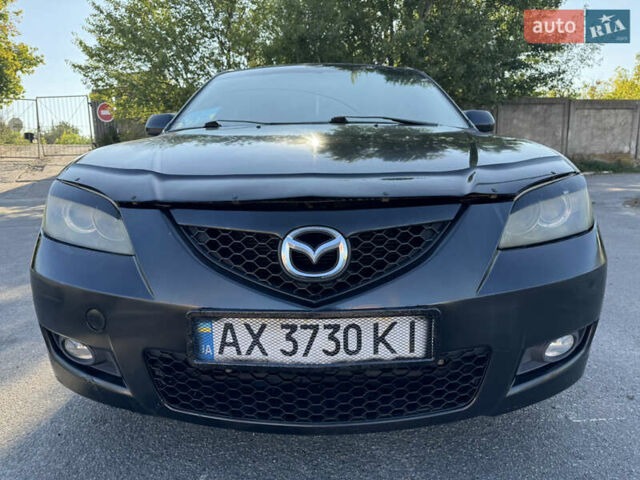 Черный Мазда 3, объемом двигателя 2 л и пробегом 150 тыс. км за 5999 $, фото 16 на Automoto.ua