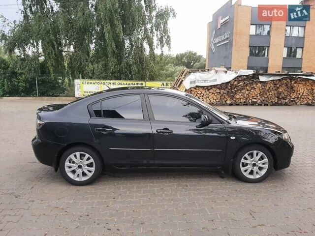 Черный Мазда 3, объемом двигателя 1.6 л и пробегом 183 тыс. км за 5800 $, фото 4 на Automoto.ua