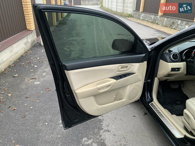 Черный Мазда 3, объемом двигателя 1.6 л и пробегом 200 тыс. км за 4999 $, фото 13 на Automoto.ua