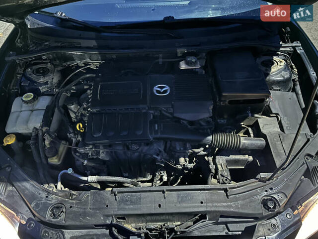 Черный Мазда 3, объемом двигателя 1.6 л и пробегом 208 тыс. км за 5500 $, фото 9 на Automoto.ua