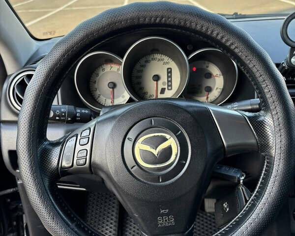 Чорний Мазда 3, об'ємом двигуна 1.6 л та пробігом 230 тис. км за 6600 $, фото 6 на Automoto.ua